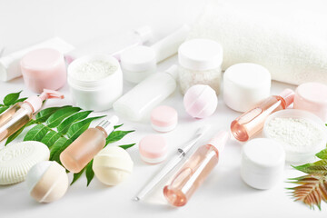 Flat lay composition Natural cosmetics ingredients for skincare, body and hair care.Top view bottles with facial treatment product white background. Makeup Layout. Set of traditional spa products.