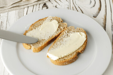 Simple breakfast. Toasted bread covered with butter