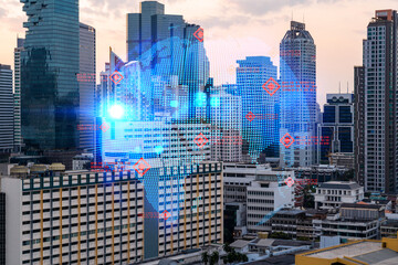 Obraz na płótnie Canvas Glowing hologram of Earth planet map on aerial panoramic cityscape of Bangkok at sunset, Asia. The concept of international business. Multi Exposure.