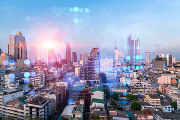 Glowing hologram of Earth planet map on aerial panoramic cityscape of Bangkok at sunset, Asia. The concept of international business. Multi Exposure.