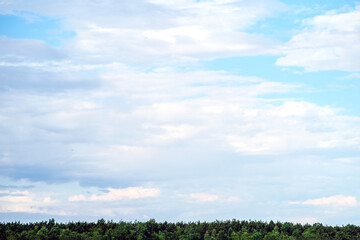 Blue sky, clouds white and beautiful. Open landscape. Twilight sky background.