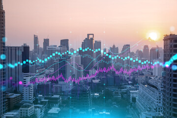 Glowing FOREX graph hologram, aerial panoramic cityscape of Bangkok at sunset. Stock and bond trading in Asia. The concept of fund management. Double exposure.