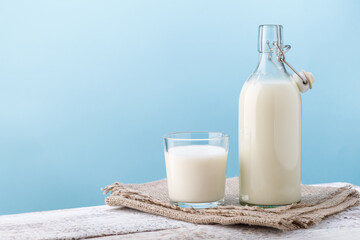 Milk. Bottle and glass with milk.