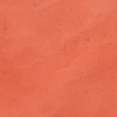 orange red painted  plaster wall