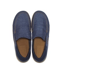 Blue slip-on casual male shoes over white background. Isolated on white. Use for catalogues, online shops, web sites, advertising booklet, poster. Top wiew. With copy space for text.