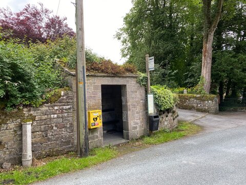 Bus Shelter, With A Defibrillator On The Wall In, Linton, Skipton, UK