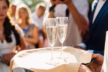waiter serving champagne