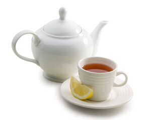 Te rojo, tetera y taza con plato. Red tea, teapot and cup with saucer.