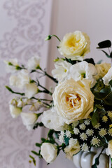 Beautiful flower arrangement of roses in a vase