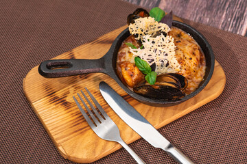 Tasty and satisfying julienne with seafood