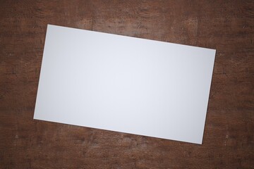 White paper sheet on wooden background. Template of A4 document and blank space for text.
