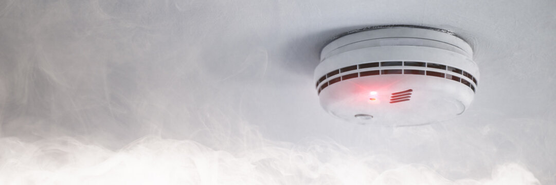 Smoke detector in case of fire alarm as fire protection warning