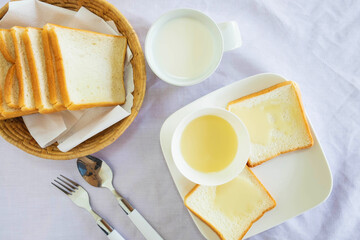 .Bread and sweetened condensed milk on the table