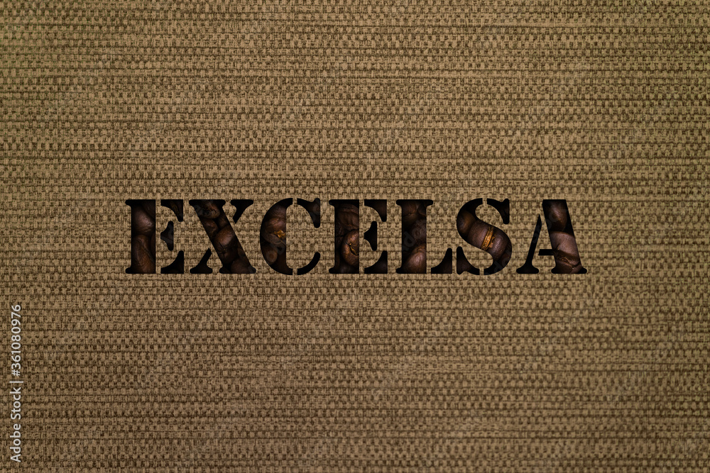 Fototapete Excelsa text made up of coffee beans on a canvas background