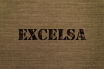 Excelsa text made up of coffee beans on a canvas background