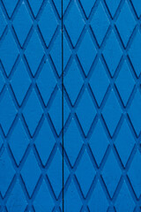 Naklejka premium Arrière plan matière bois avec motif losange bleu