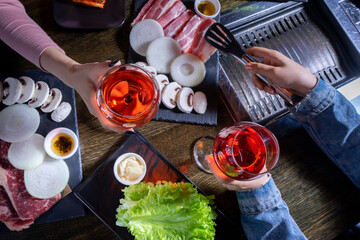 Preparation of meat frying on the grill 