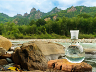 Obraz premium Glass flask with clean drinking water.