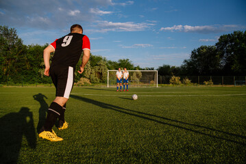 Soccer player kicks the ball.Soccer player takes the free-kick. © bo.kvk