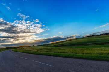road in the countryside on sunset background