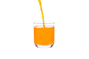 Pouring squeezed orange juice into a glass On a white background