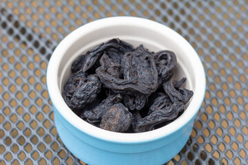 Garcinia cambogia or Goraka, Garcinia gummi-gutta, is a tropical sun dried fruit used in cooking in India, Sri Lanka, Indonesia, Thailand, Malaysia and Burma