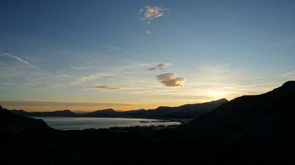 the sunset at the Port Pollenca, on the island Mallorca, Spain, in the month of January