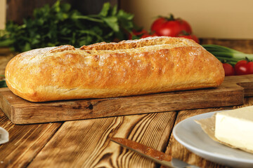 Fresh baked loaf of bread with butter bar