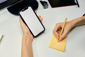 hand holding a credit card