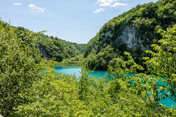 Picturesque morning in Plitvice National Park. Colorful spring scene of green forest with pure water lake. Great countryside view of Croatia, Europe