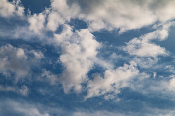 Fototapeta na wymiar Blue sky with sun behind the clouds. Meditation zen nature 