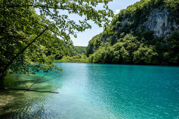 Picturesque morning in Plitvice National Park. Colorful spring scene of green forest with pure water lake. Great countryside view of Croatia, Europe