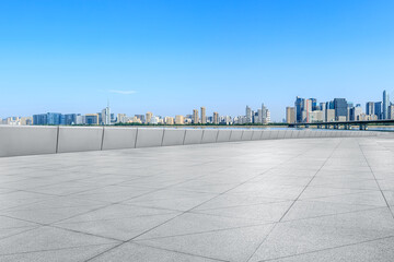 Obraz premium Empty floor and city skyline with buildings in hangzhou,China.