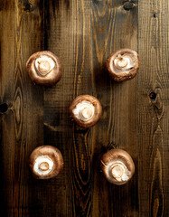 Fototapeta na wymiar mushrooms on a wooden table