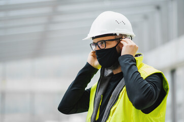 Portrait of worker with face mask at the airport.