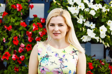 Beautiful natural woman in the garden of apple