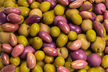 Fototapeta na wymiar Tasty mix olives background.