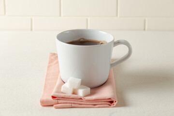 Obraz na płótnie Canvas cup of coffee and sugar cubes