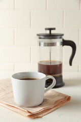 cup of coffee and teapot