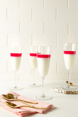 glasses of champagne with panna cotta