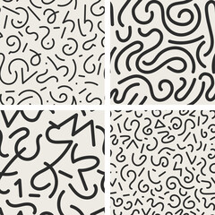 Set of 4 seamless trendy fashion abstract backgrounds in doodle style. Vector creative patterns