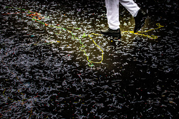 walking on a confetti coverd street