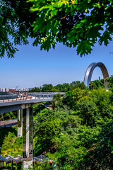 View of the bicycle and pedestrian bridge Arch of Peoples' Friendship. Kyiv. Ukraine. - 361102345