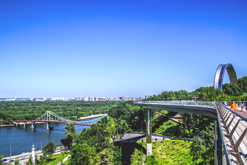 View of Kyiv and the bicycle and pedestrian bridge. Kyiv. Ukraine. - 361102359