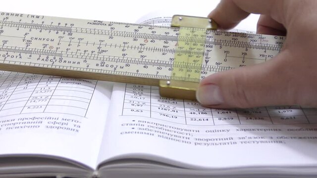 Make calculations on a logarithmic ruler.