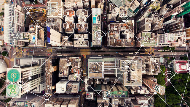 Top view aerial photo of a Hong Kong cityscape with advanced modern infrastructure. Financial and business centers in developed China town. Map with wireless networking connection infographics icons