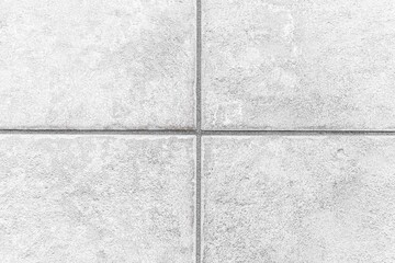 White stone floor texture and seamless background.