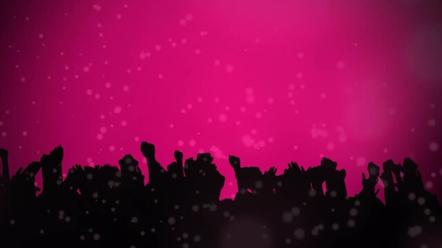 Pink shapes moving against silhouette of people dancing in concert