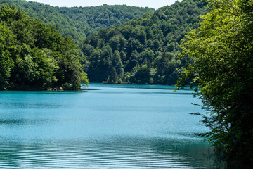 Picturesque morning in Plitvice National Park. Colorful spring scene of green forest with pure water lake. Great countryside view of Croatia, Europe