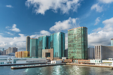 Fototapeta na wymiar Pier and modern office building in downtown of Hong Kong city